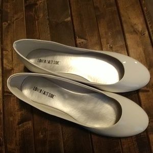 White patent leather ballet flats